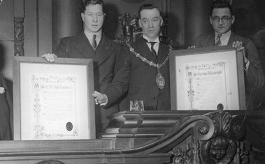 1936-38 Bob Leivers and Norman Wainwright receiving illuminated address from Mayor of Stoke-on-Trent